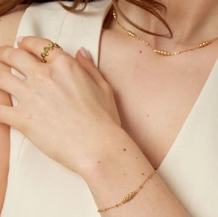Armband Gedraaide bedel goud