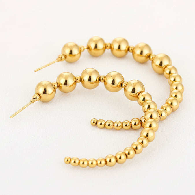 Oorbellen Kralen Dots goud liggend