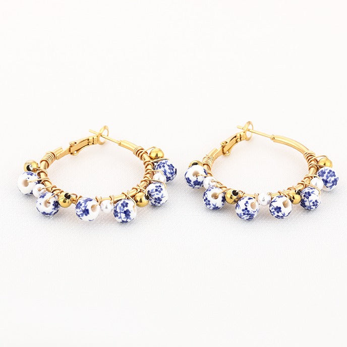 Oorbellen Bedels Strand goud wit blauw vooraanzicht liggend vooraanzicht