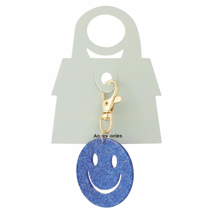 Sleutelhanger Keep Smiling goud blauw