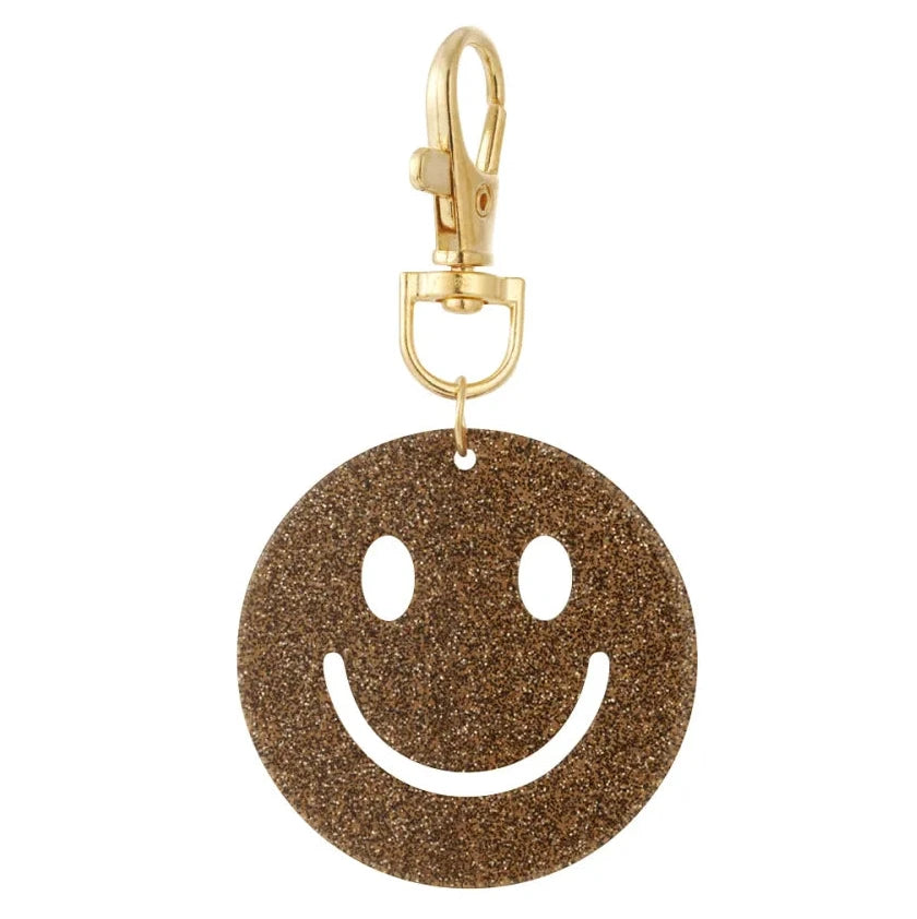 Sleutelhanger Keep Smiling goud donkerbruin