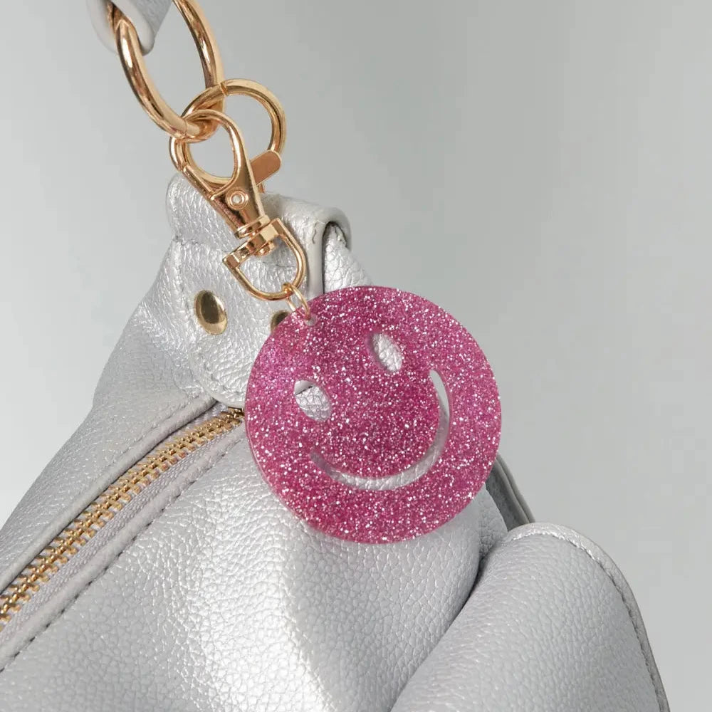 Sleutelhanger Keep Smiling goud roze sfeer
