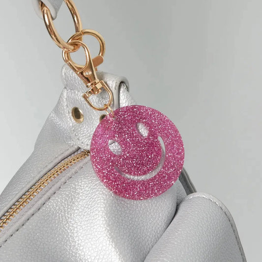 Sleutelhanger Keep Smiling goud roze sfeer